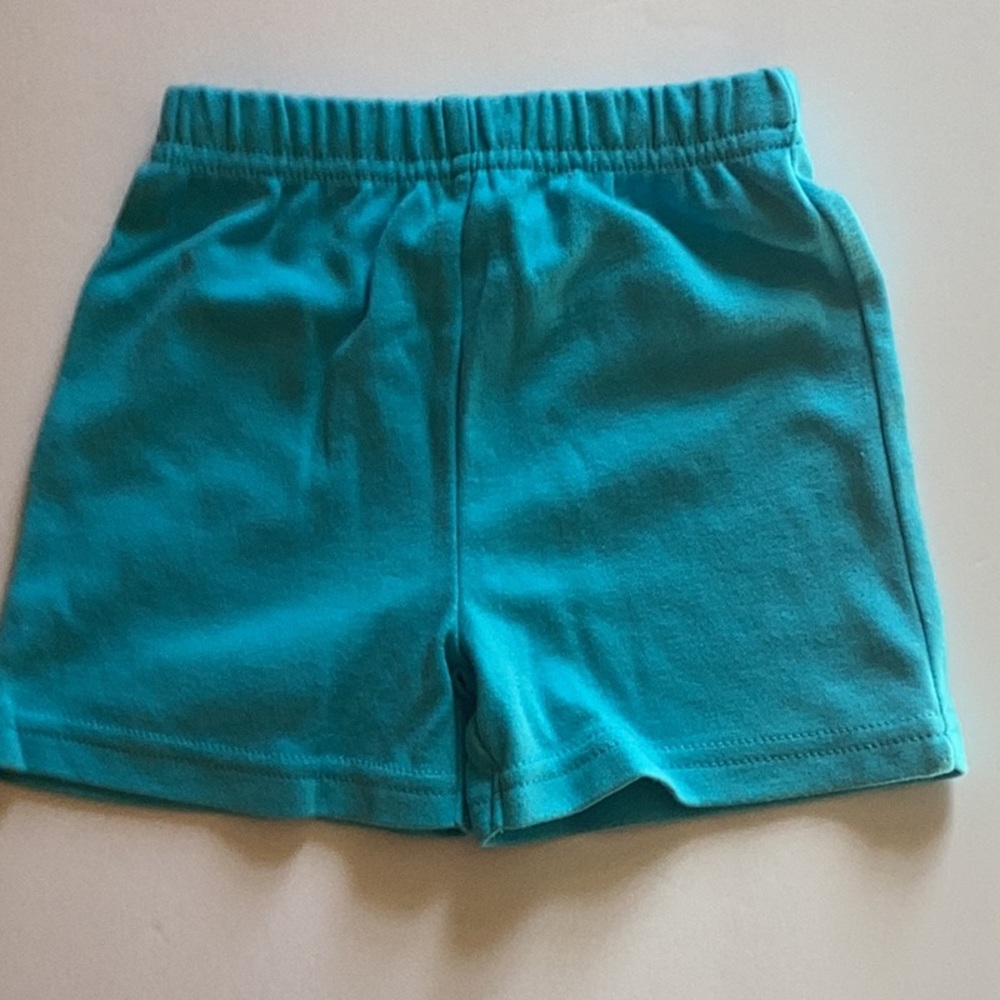 Kidgets 3/6M Blue shorts with a pair of blue socks